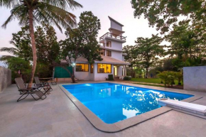 StayVista's Santoni Farms - Riverside Bliss with Pool, Orchard & Activities